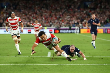 Japan outplays Scotland to make rugby quarter-finals debut