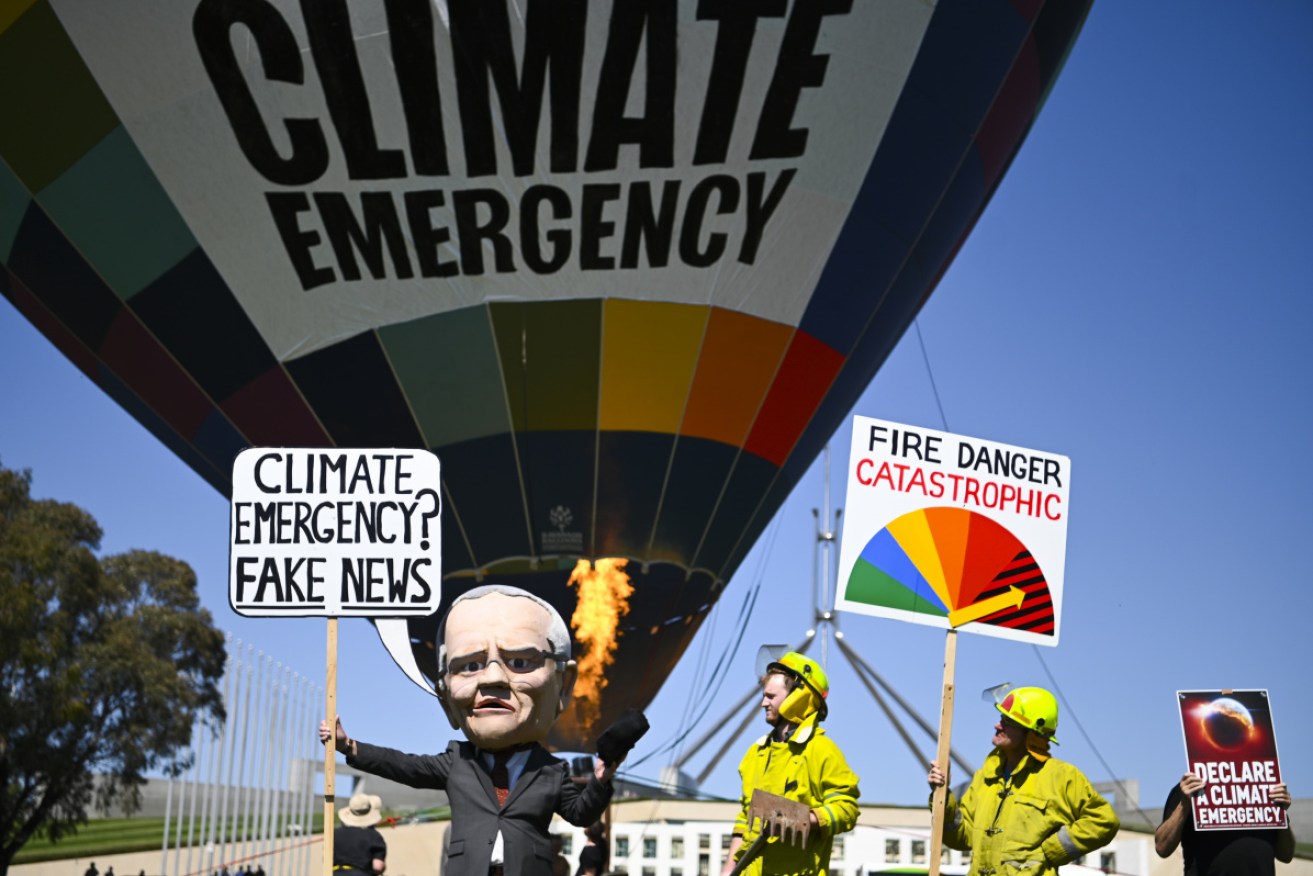 A puppet depicting Prime Minister Scott Morrison at a climate rally outside Parliament House in Canberra.