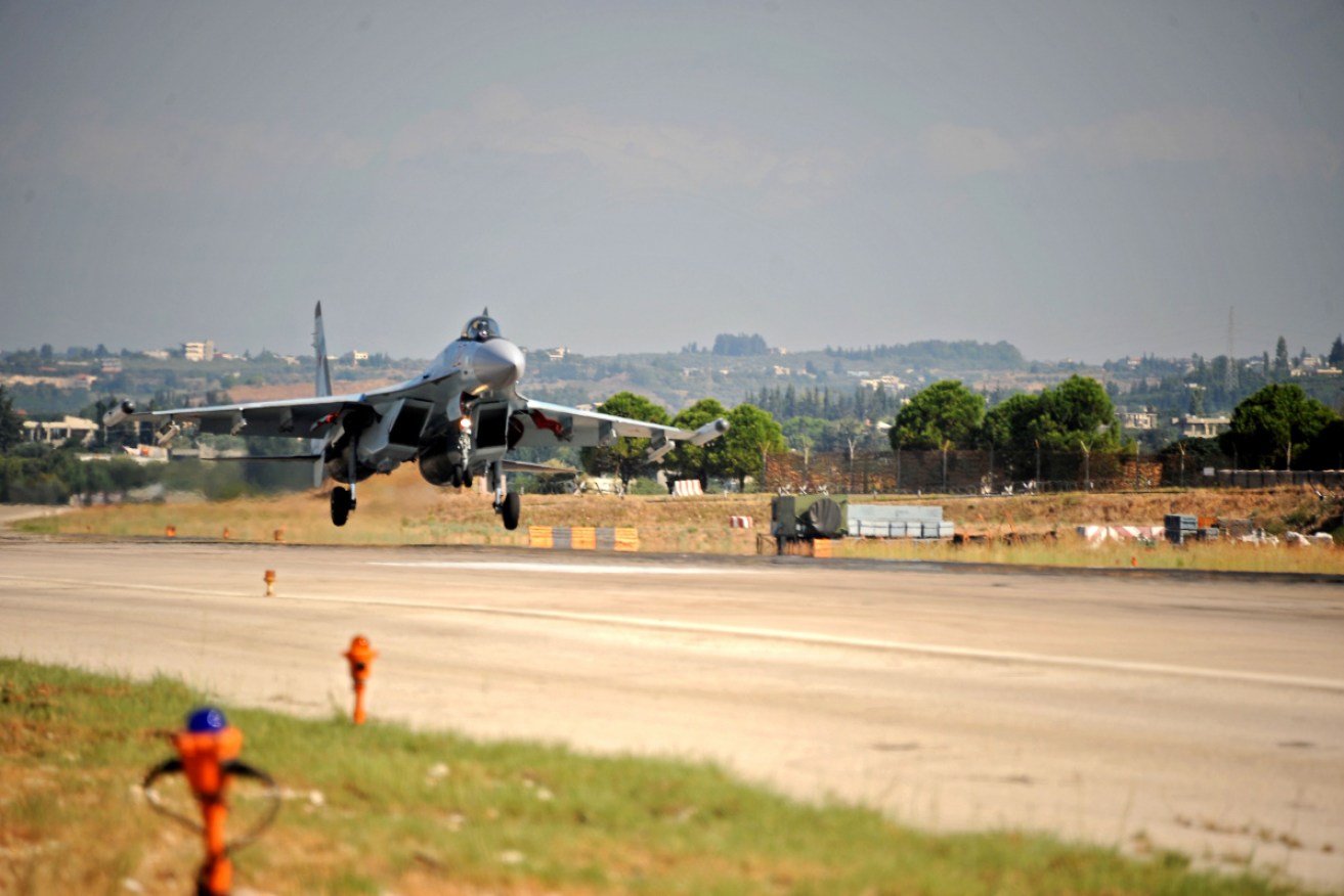 A fighter jet takes off at the Russian military base of Hmeimim, located south-east of the Syrian city of Latakia.