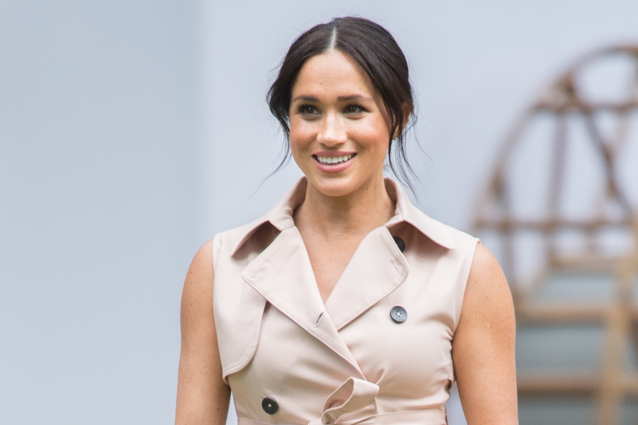 Meghan Markle has admitted intense media scrutiny has been a 'struggle'.