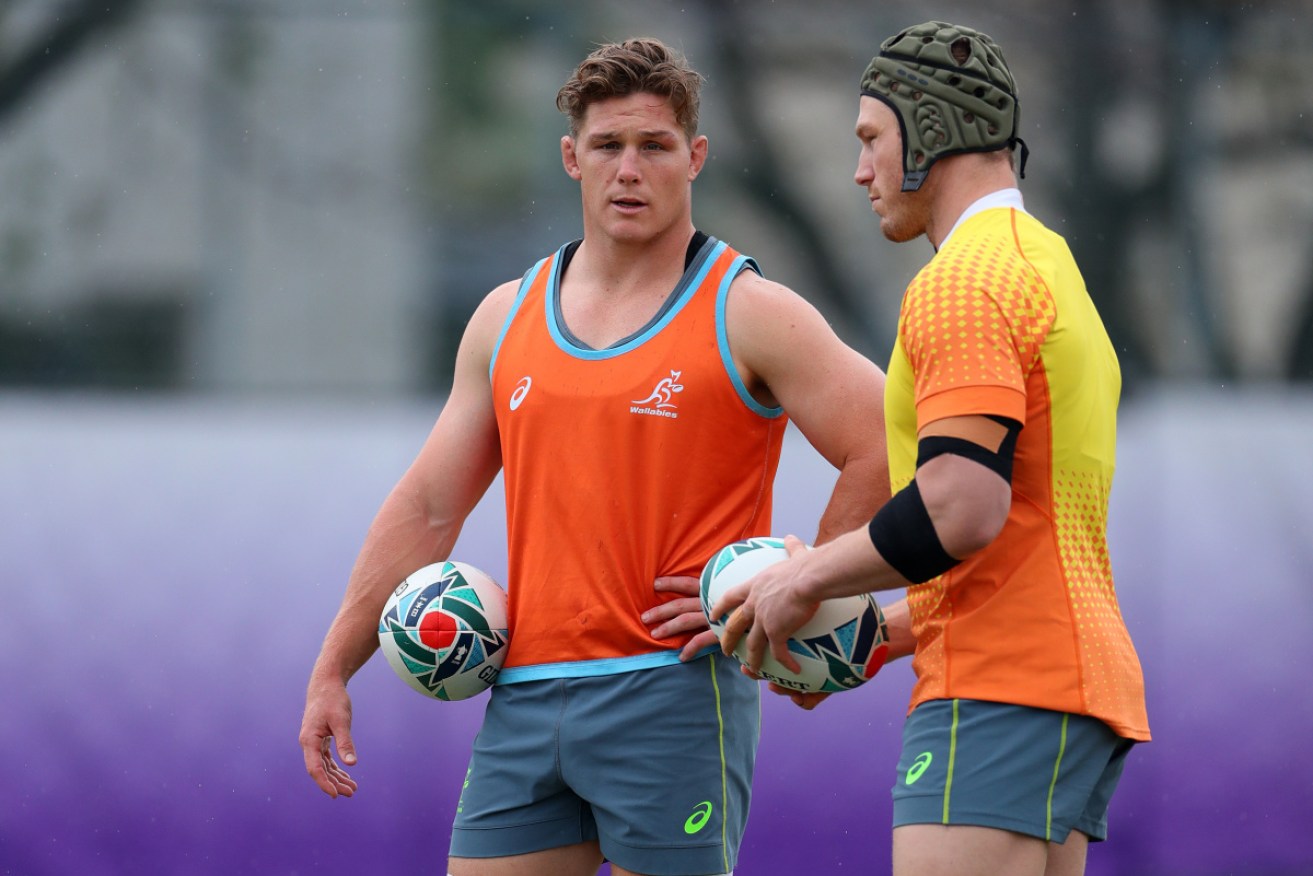 When are we back? Wallabies Michael Hooper and David Pocock at a training session before the shutdown.  