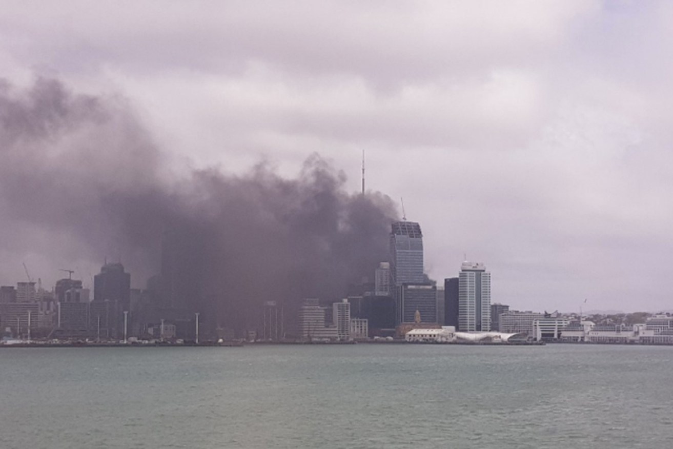 Smoke from the Sky City fire billows across the Auckland skyline.