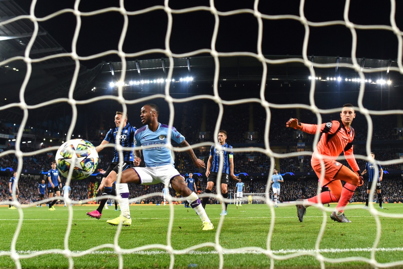 Raheem Sterling   scores Manchester City's fifth goal against Atalanta.