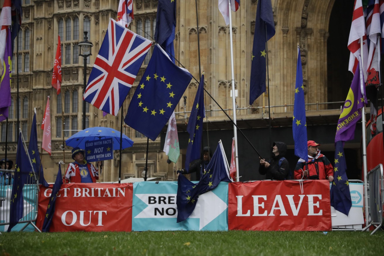 Protesters from both sides of the Brexit debate outside the British parliament on Friday.