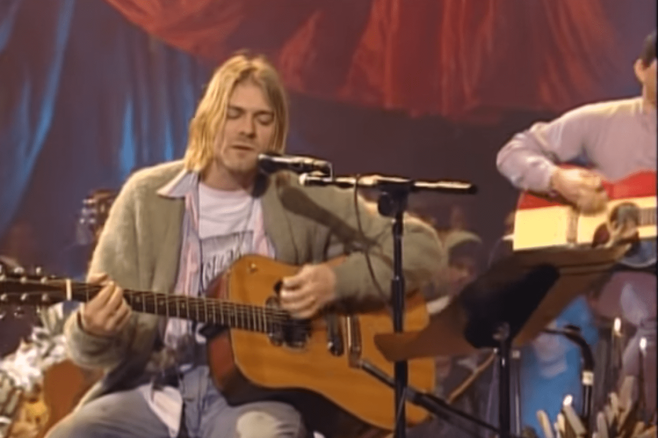 Grunge rocker Curt Cobain's nondescript cardigan has fetched almost half a million dollars.