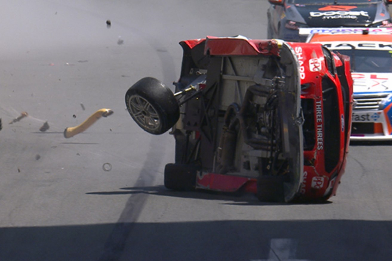 Scott McLaughlin's Mustang on its side after a big crash on the Gold Coast street circuit. 