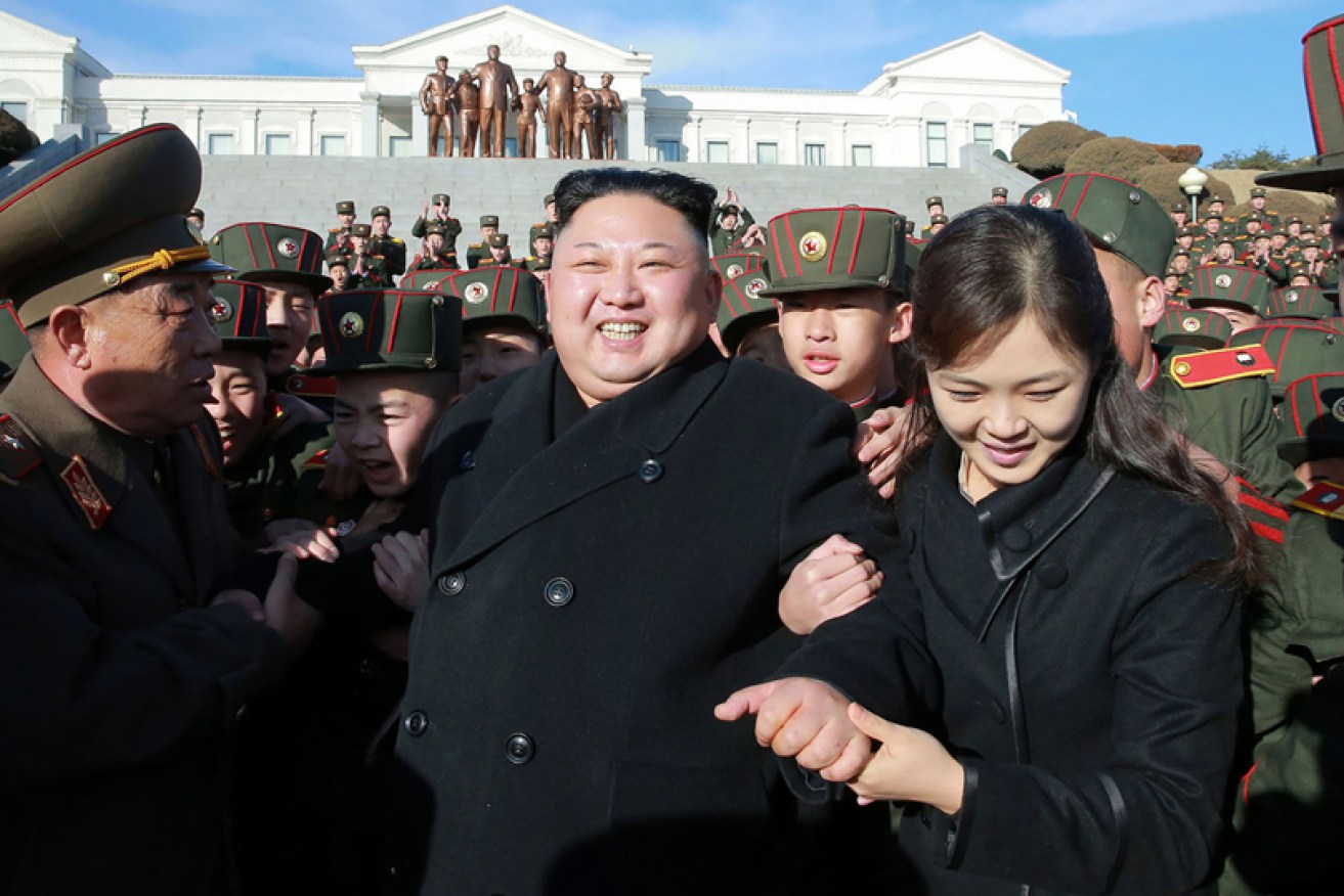 Kim Jong-un and wife Ri Sol-ju plant trees in Pyongyang in March 2017.