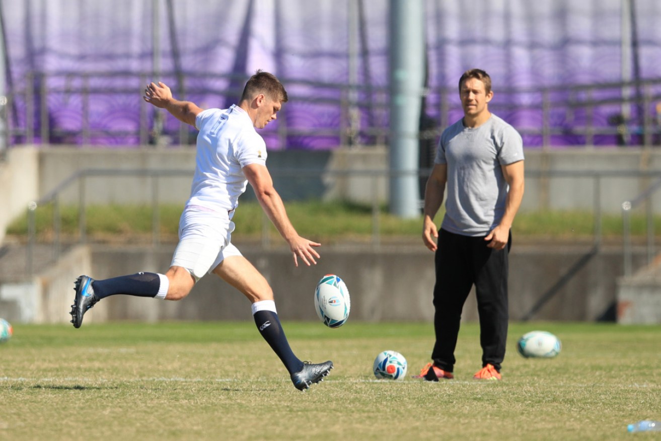 England's Owen Farrell and Jonny Wilkinson during a training session at Fuchu Asahi Football Park, Tokyo. 