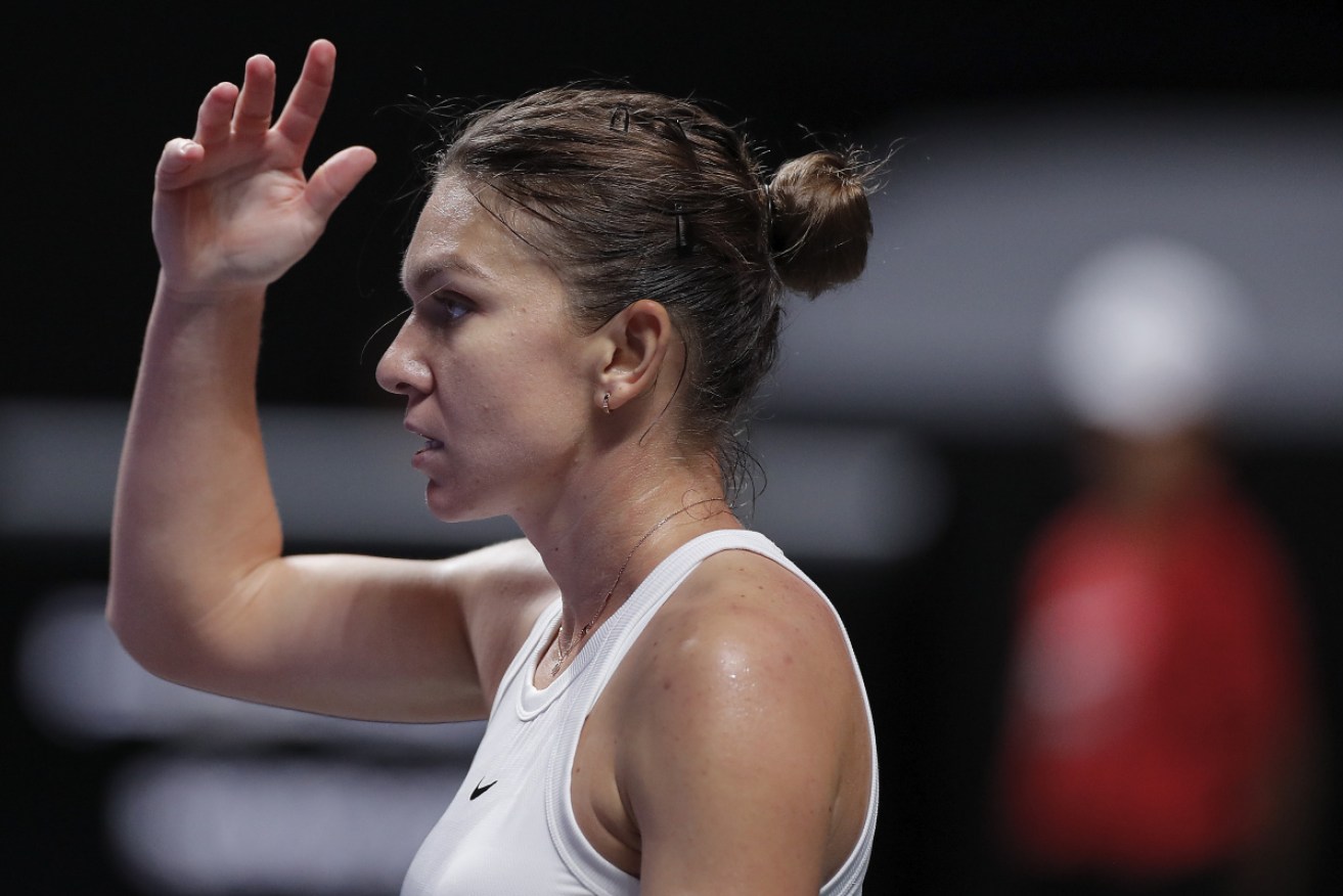 Halep reacts in frustration after losing yet another point during the match.