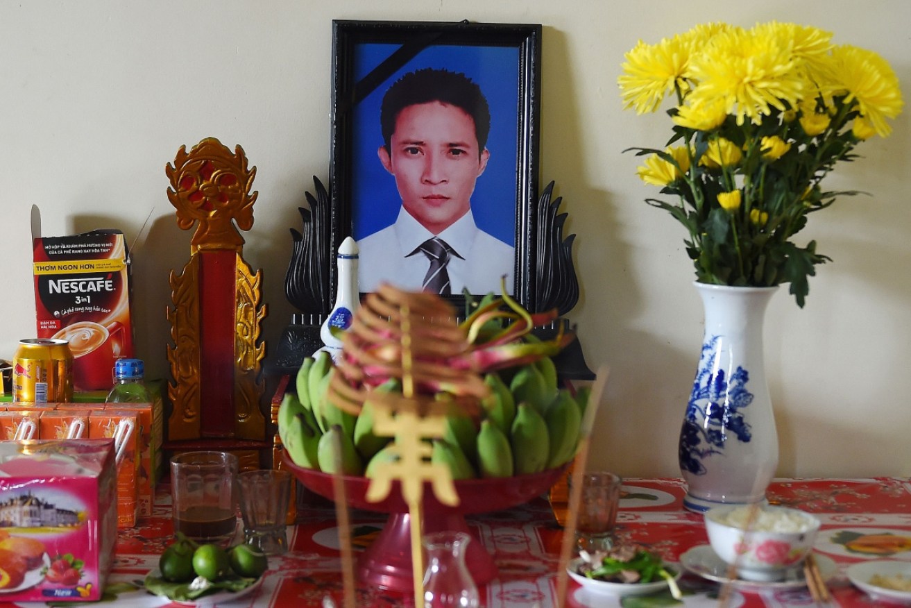 A portrait of suspected Essex truck victim Le Van Ha, 30, is kept on a prayer altar at his house in Vietnam's Nghe An province.
