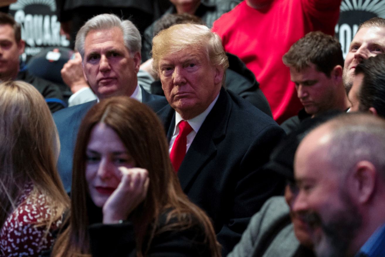 The ultimate fighting fans cheered him, but Donald Trump still wore a scowl at Madison Square Garden.