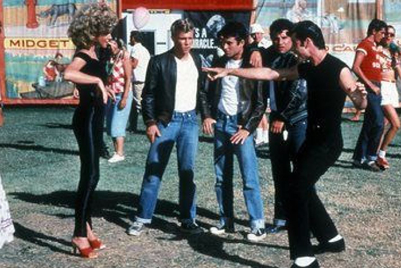 Olivia Newton-John in her money-making pants with John Travolta in <i>Grease.</i>