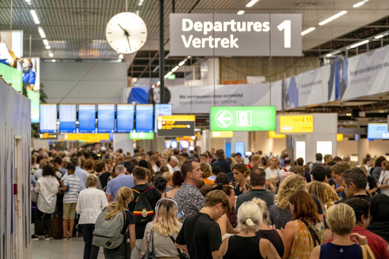 A Spanish airline says a security threat was triggered at Amsterdam's Schiphol airport when a hijacking warning on a plane was set off accidentally.