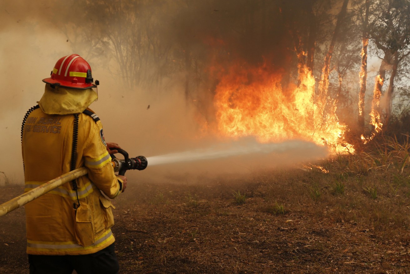 Scott Morrison and Gladys Berejiklian were briefed on the bushfires during a visit to northern NSW.