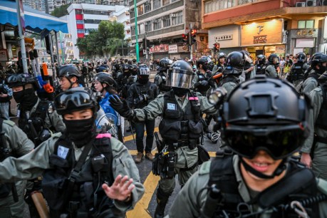 Hong Kong police open fire, wound protester