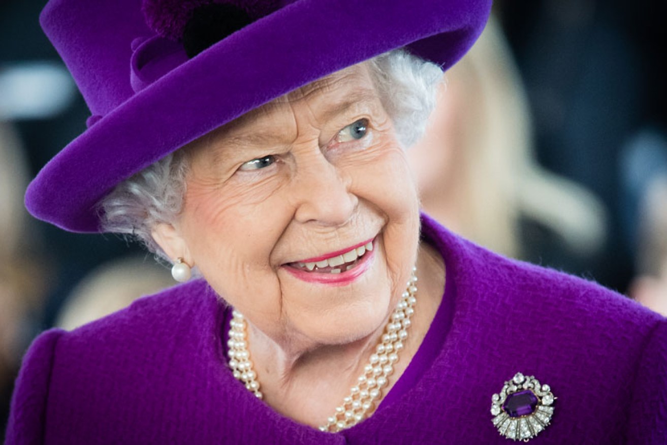 Queen Elizabeth cracks out diamonds and pearls at a charity event ion November 6.