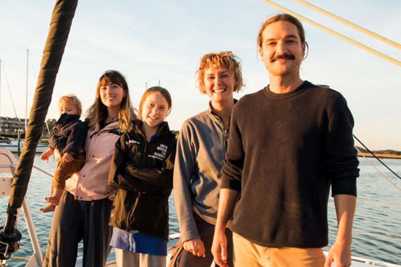 Ms Thunberg (centre) and British sailor Nikki Henderson (second right) are joining the family on the catamaran La Vagabonde.