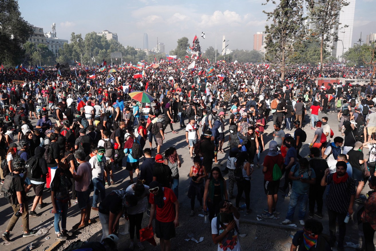 Over 200,000 have taken to the streets of in cities across Chile calling for widespread reforms.