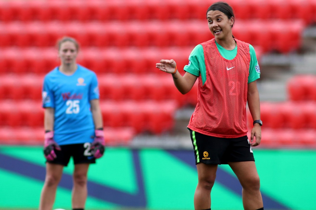 Sam Kerr enjoys a joke at Matildas training in Adelaide on Monday. Photo: AAP