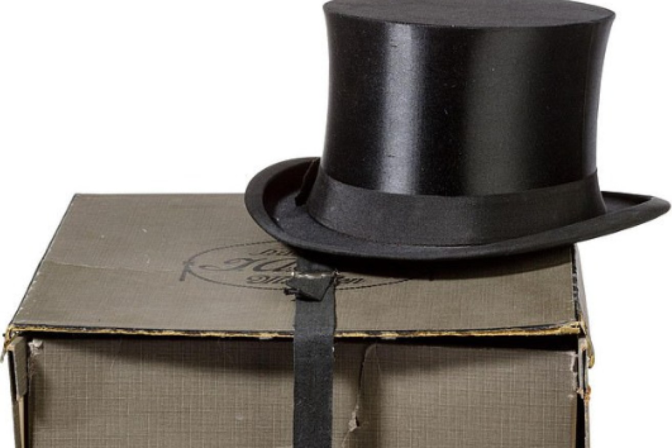 Adolf Hitler's top hat, complete with box, is going on the block despite calls for the auction to be abandoned.