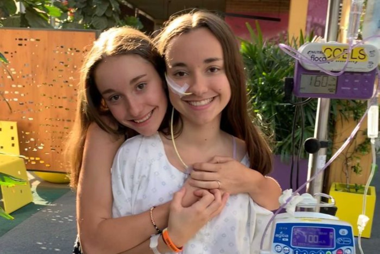 Stella Artuso, with sister Sienna (left) developed symptoms after rolling her ankle at school. 