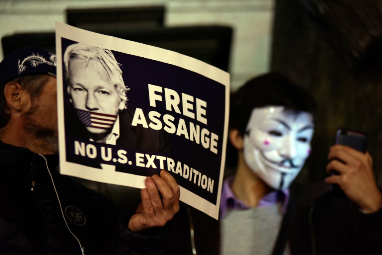 Supporters of Julian Assange demonstrate in downtown Paris, France, on November 2. 