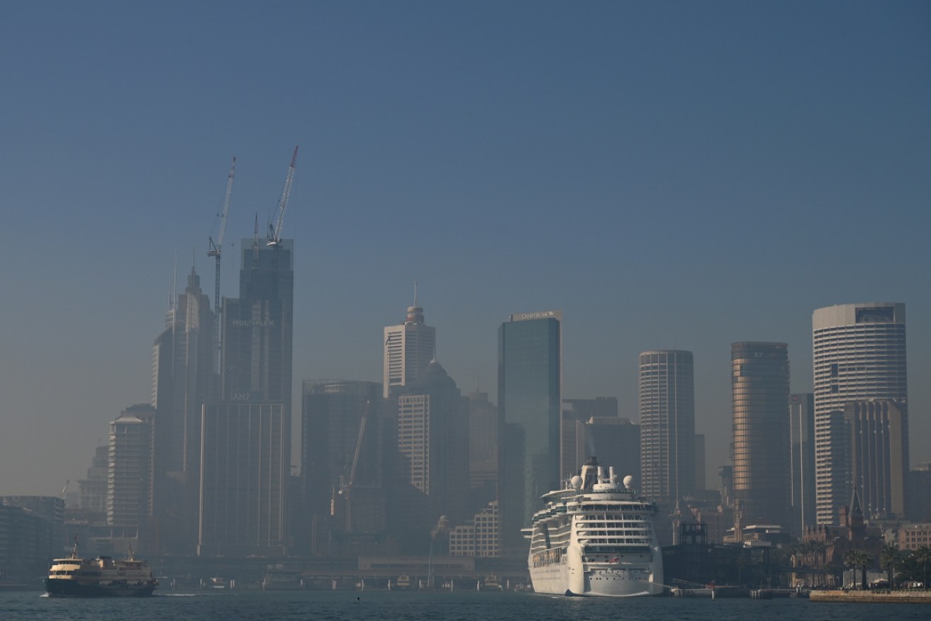 A smokey Sydney CBD skyline on Tuesday. Air quality was also poor across much of the city.