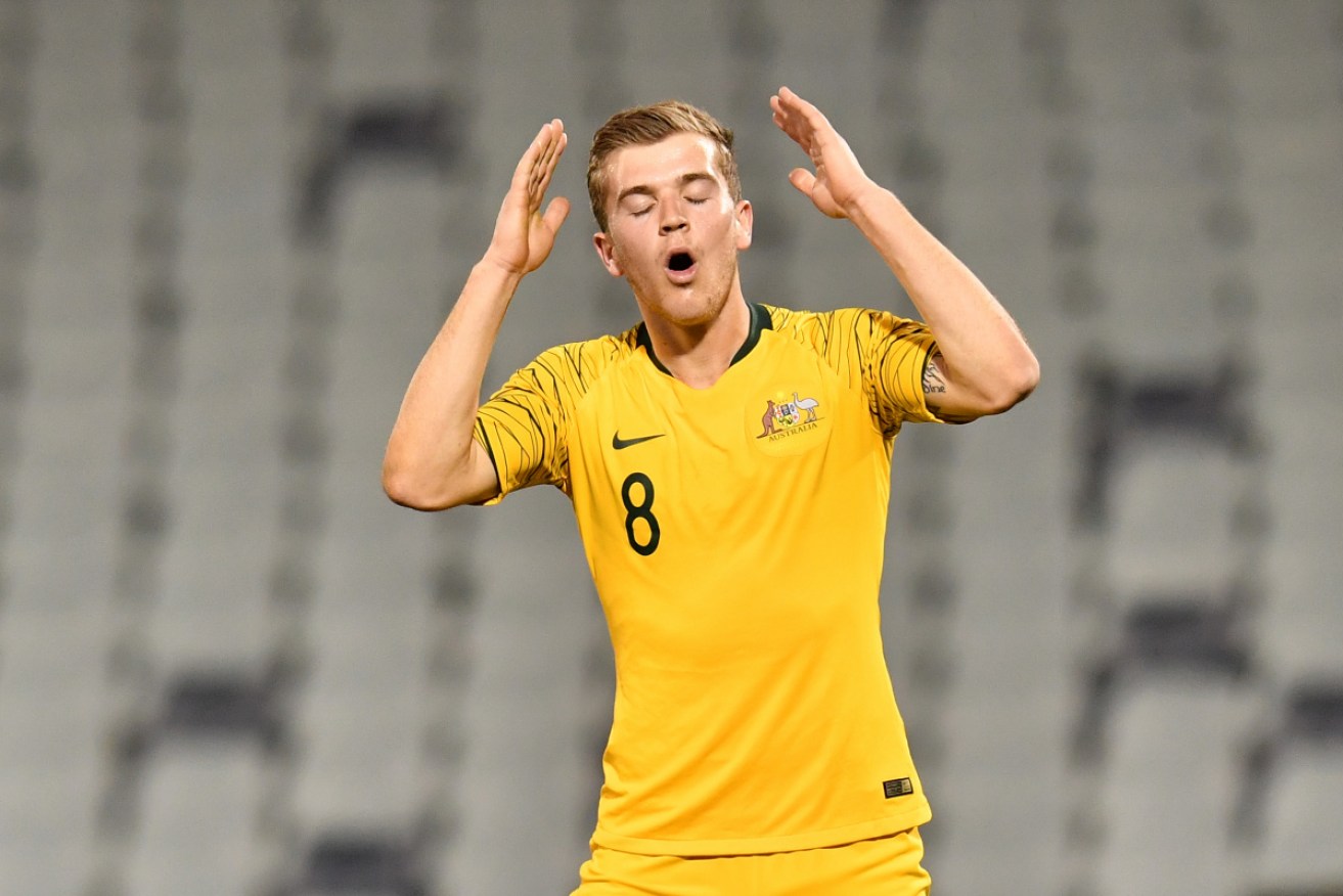 Adelaide United's Riley McGree has been banned from Olyroos action until April. 
