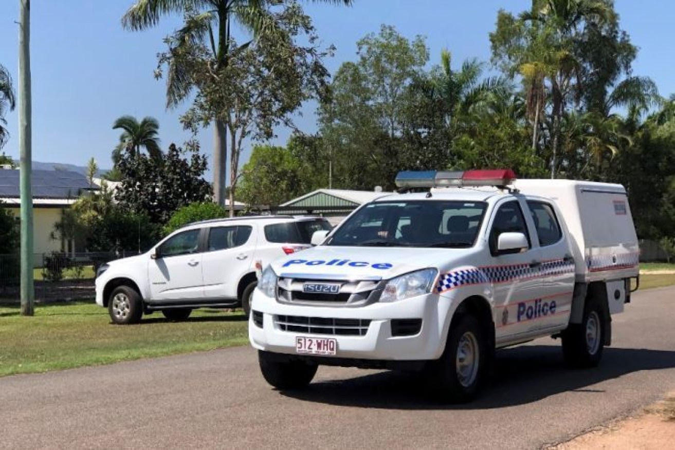 Police set up a crime scene outside the Townsville property after Wednesday's shooting.