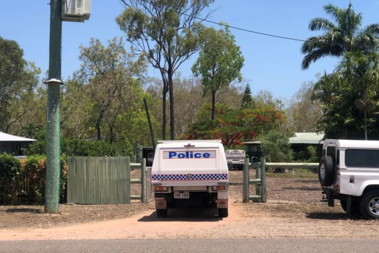 Police at the crime scene said neighbours managed to restrain the alleged attacker.