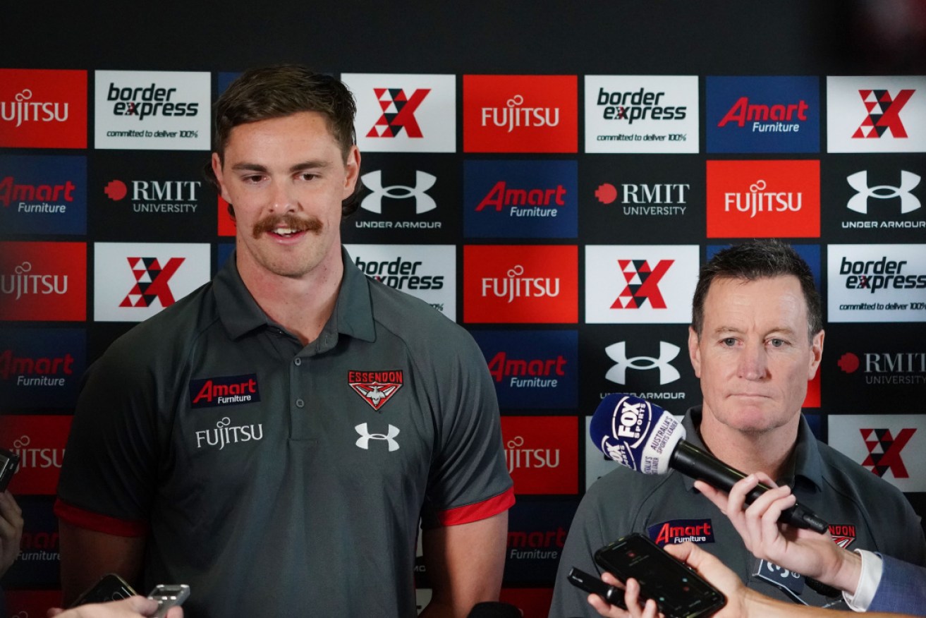 Bomber Joe Daniher (L) and coach John Worsfold at Essendon's media conference on Thursday. 