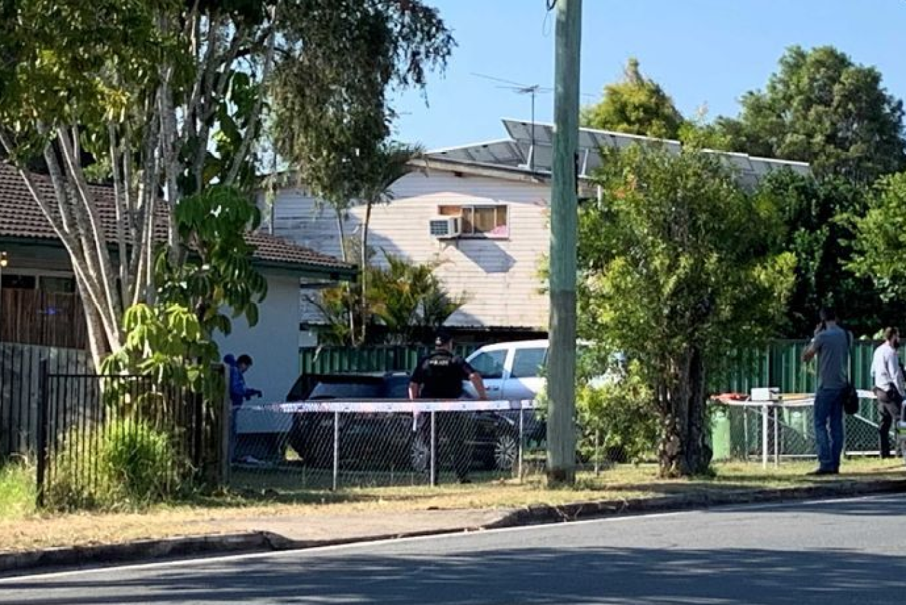 A home south of Brisbane has been turned into a crime scene after two little girls died after allegedly being found in a hot car.