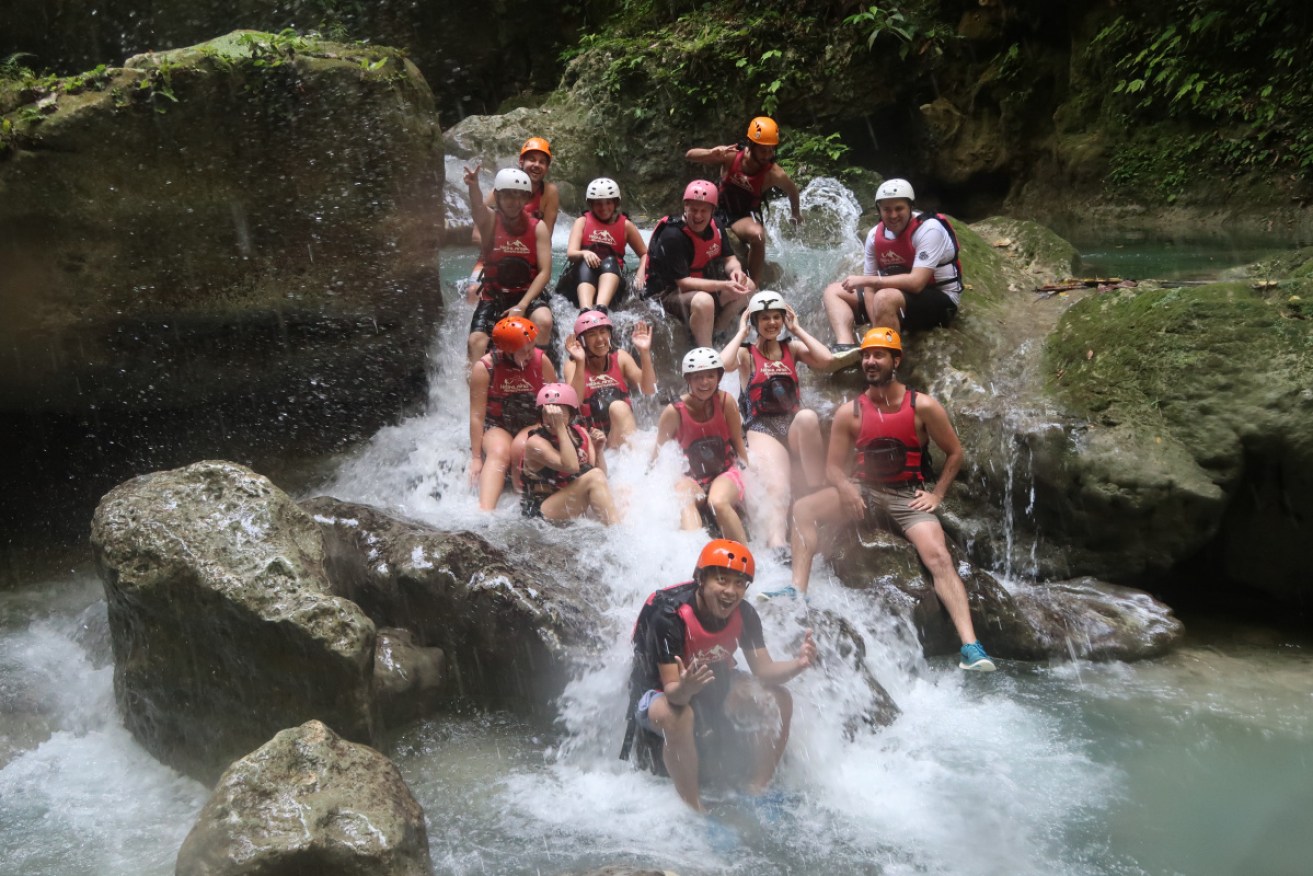 Groups take a break to cool off from the rigours of canyoneering at Cebu’s Kawasan Falls.