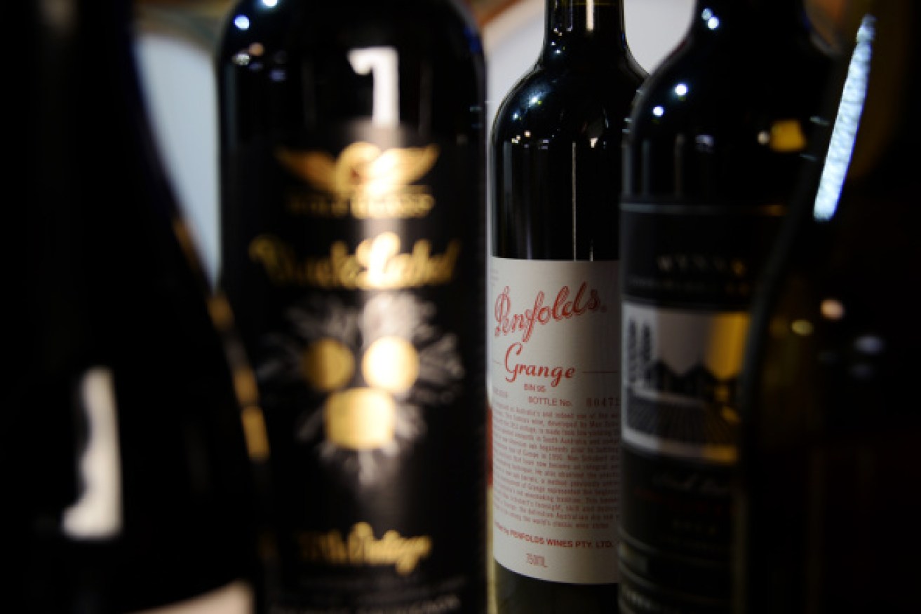 Two people were arrested over the sale of fake Penfolds wine.