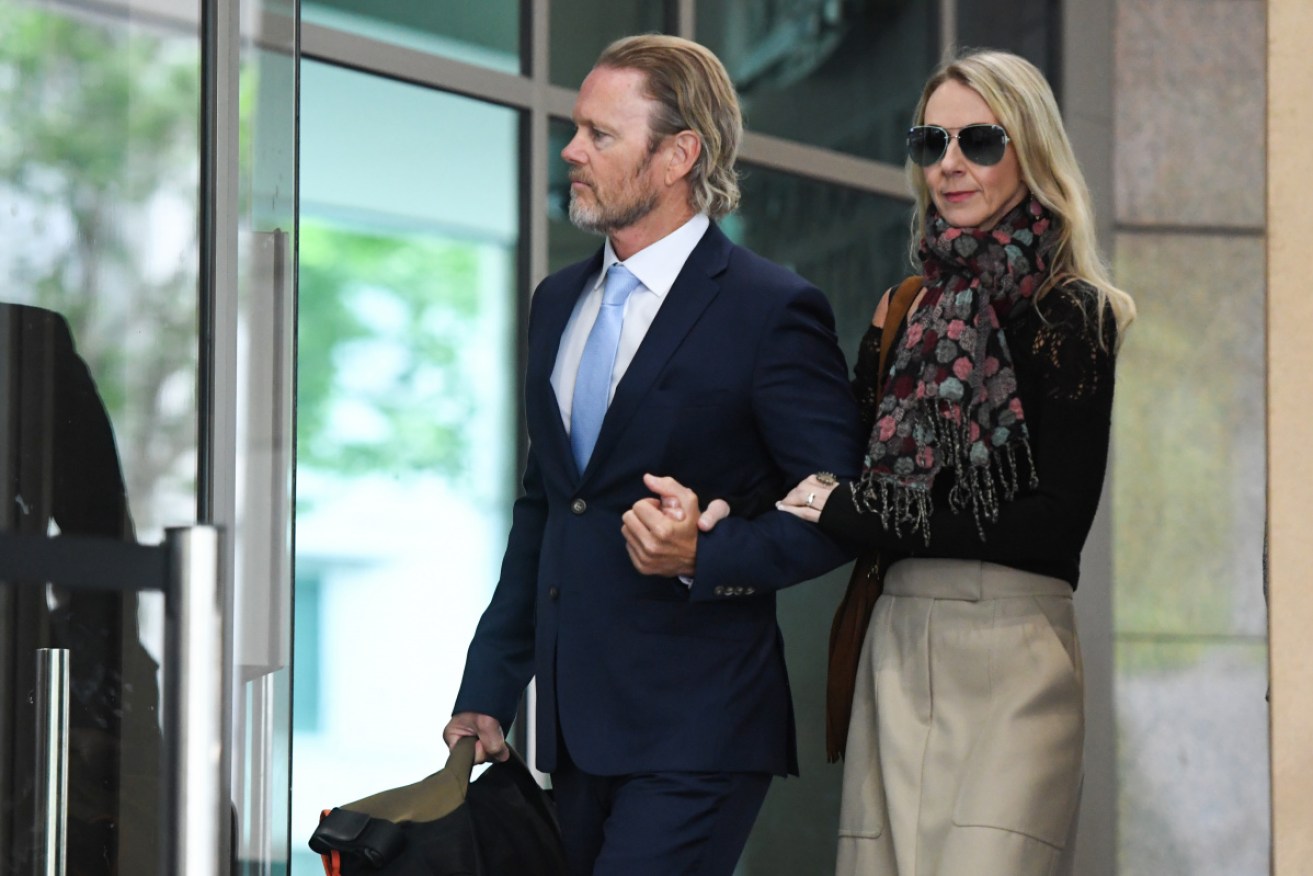 Craig McLachlan arrives at court in Craig McLachlan, here with partner Virginia Scammell,  was acquitted on all charges, later accusing Magistrate Belinda Wallington of bias.