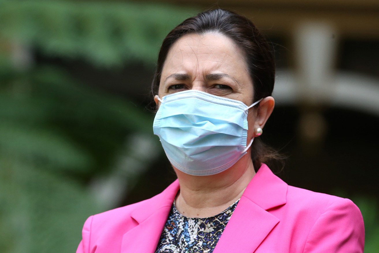 Premier Annastacia Palaszczuk has told Queenslanders "there's no need to panic" after confirmation of the four new local COVID infections.