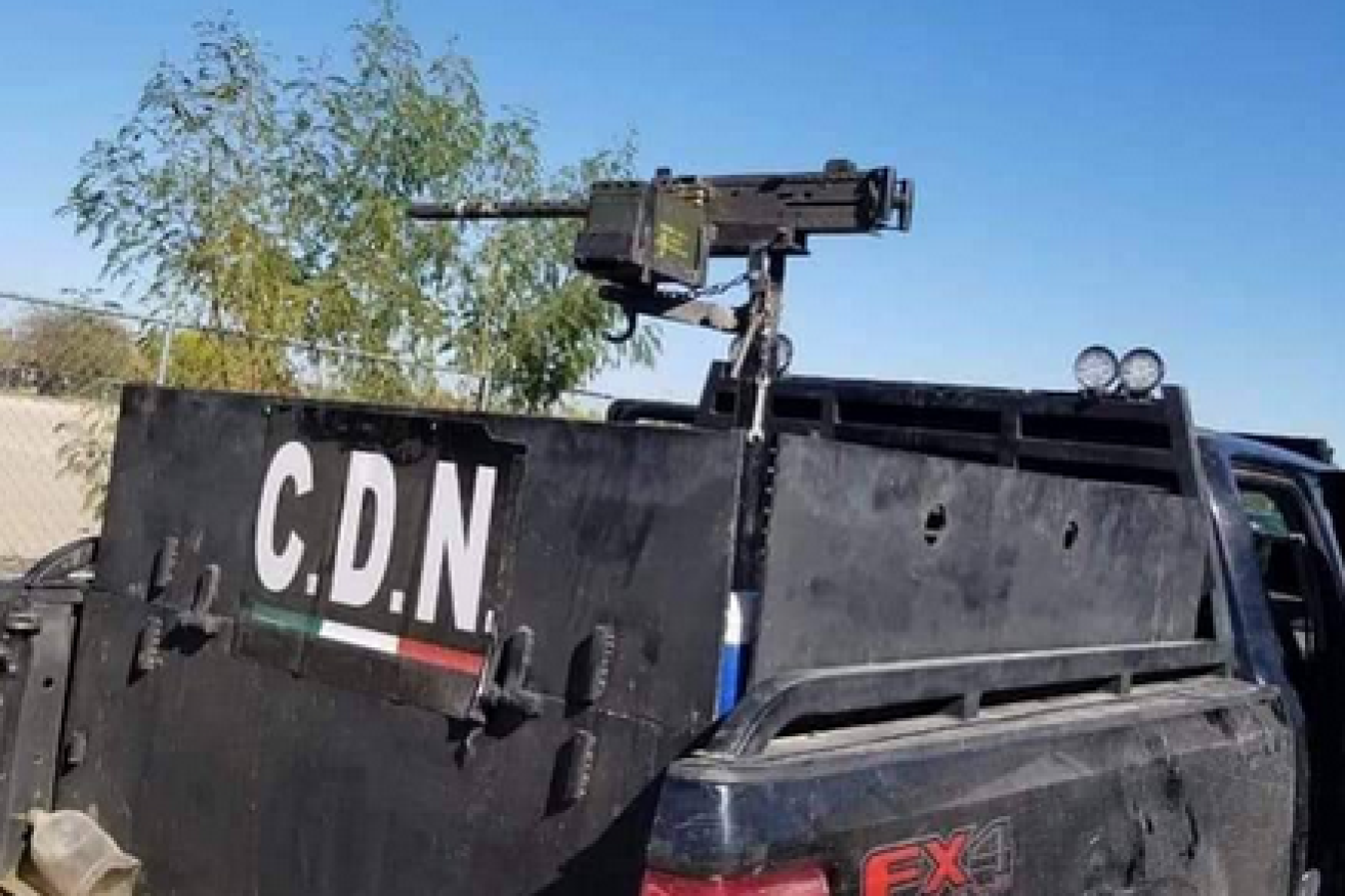 Mexico is now so lawless that drug cartels openly patrol their turf in armoured vehicles like this machine-gun equipped war wagon.