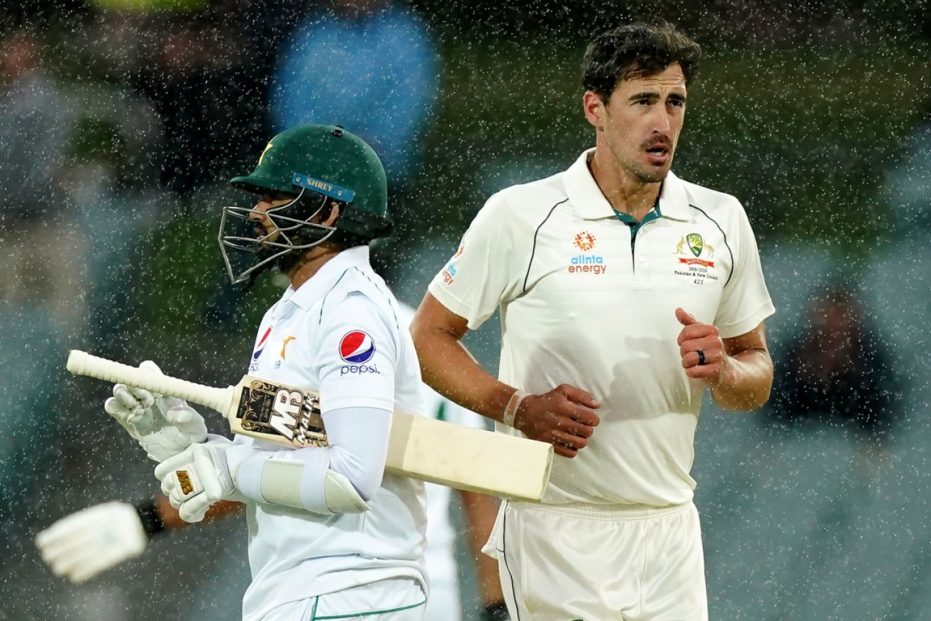 Rain falls and so does Pakistan: Azhar Ali leaves the field after being dismissed by Mitchell Starc. 