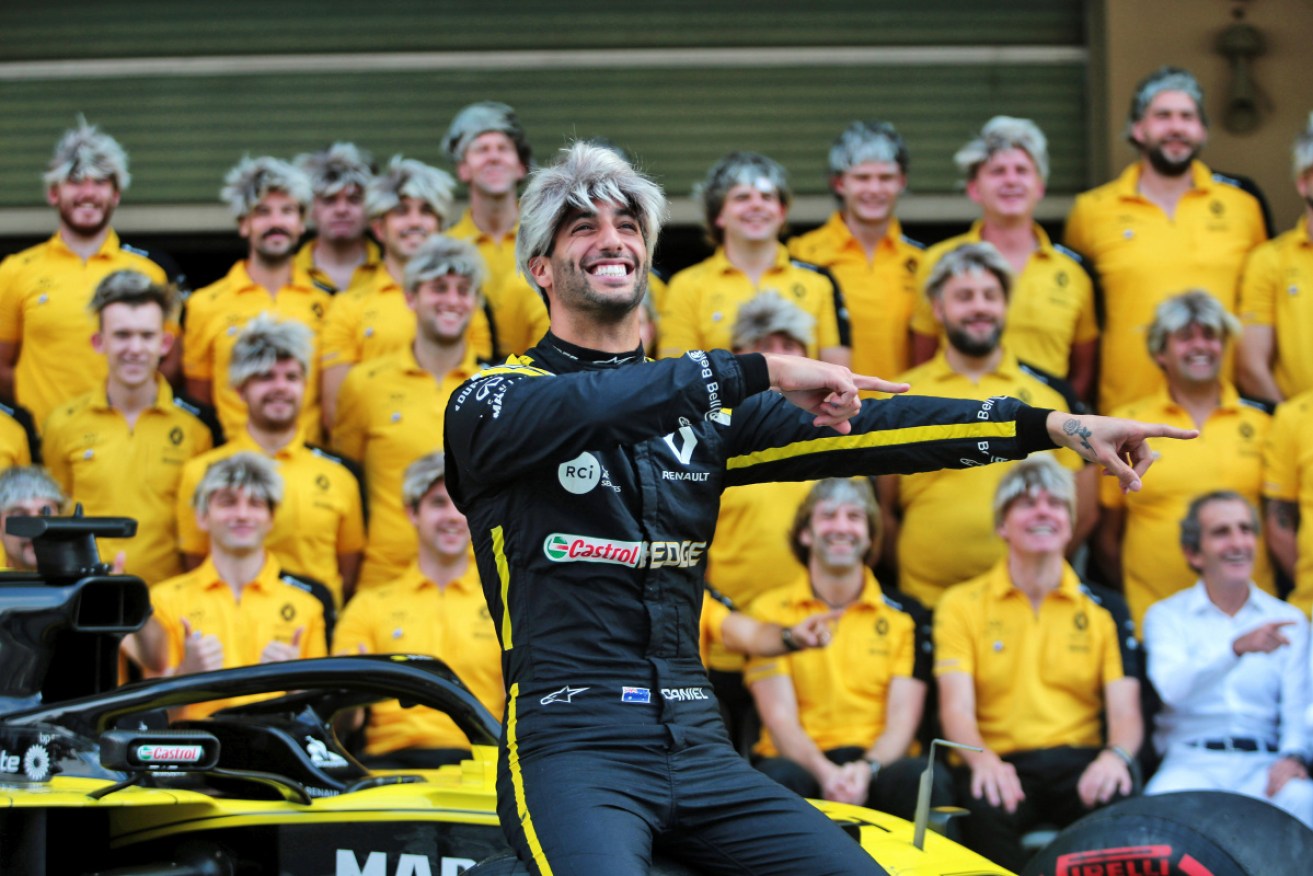 Daniel Ricciardo farewells teammate Nico Hulkenberg in style with a blonde wig. 