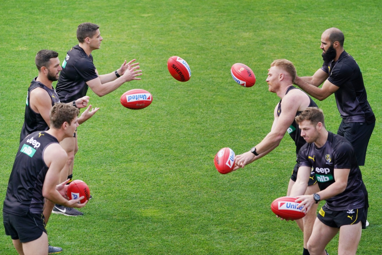 Richmond players get in some ball work at pre-season training on Monday. 