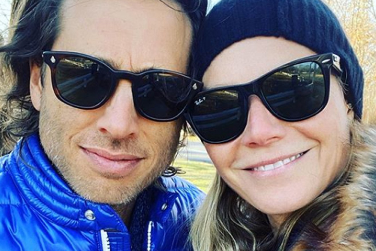 Goop founder Gwyneth Paltrow rugs up with husband Brad Falchuk on December 1.