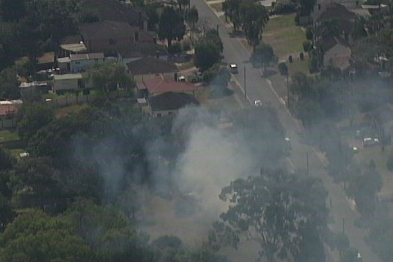The blazes are threatening homes near Penrith.