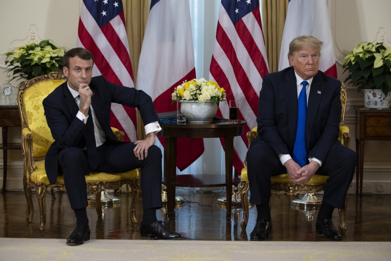 President Donald Trump meets President Emmanuel Macron at Winfield House during the NATO summit.