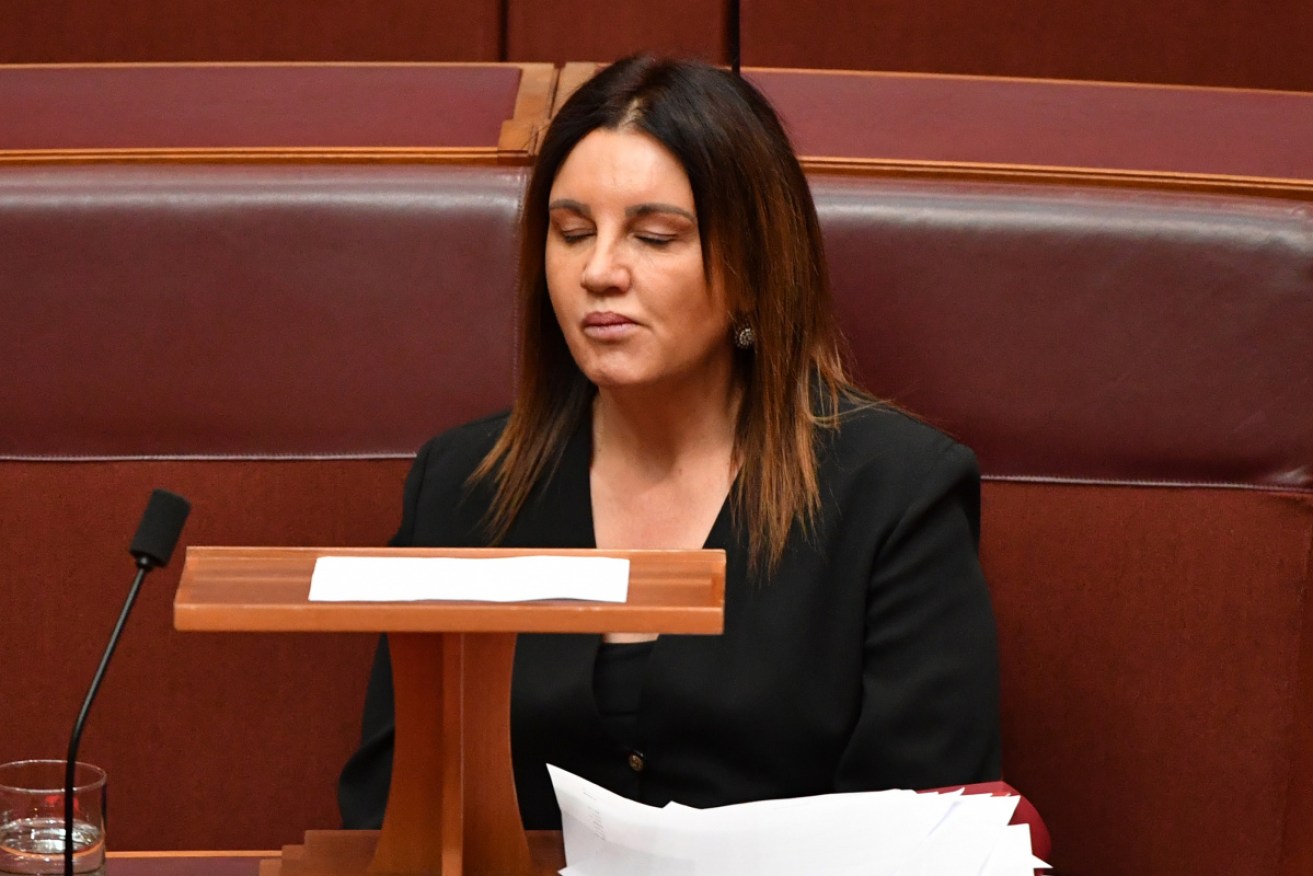 An emotional Jacqui Lambie has given her support to repeal refugee medical evacuation laws.