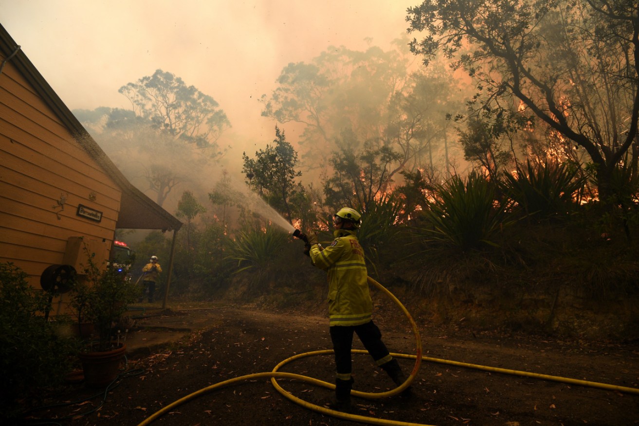 Fire crews who have been battling to save homes will make the most of a weather reprieve to undertake backburning.  