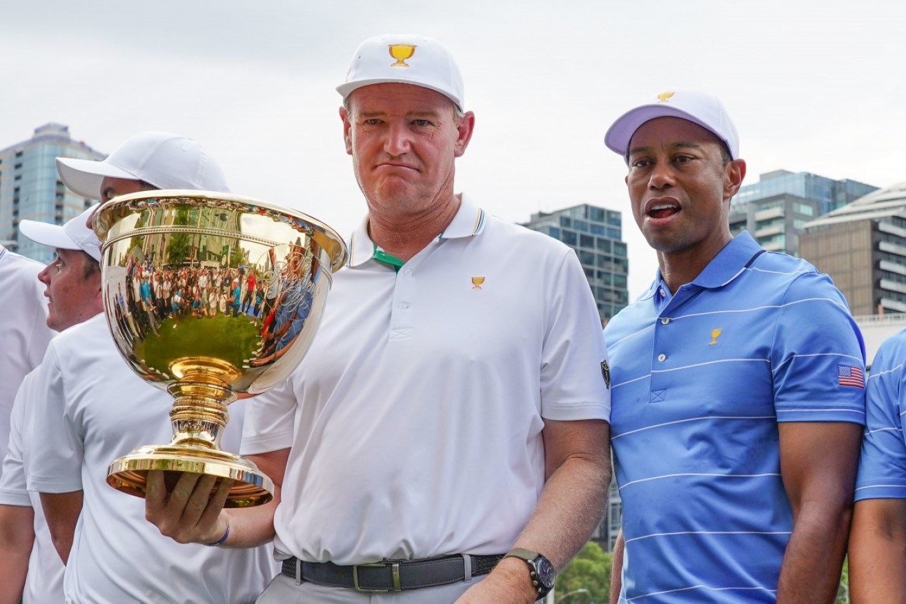Team captains Ernie Els and Tiger Woods with the Presidents Cup trophy in Melbourne on Monday. 