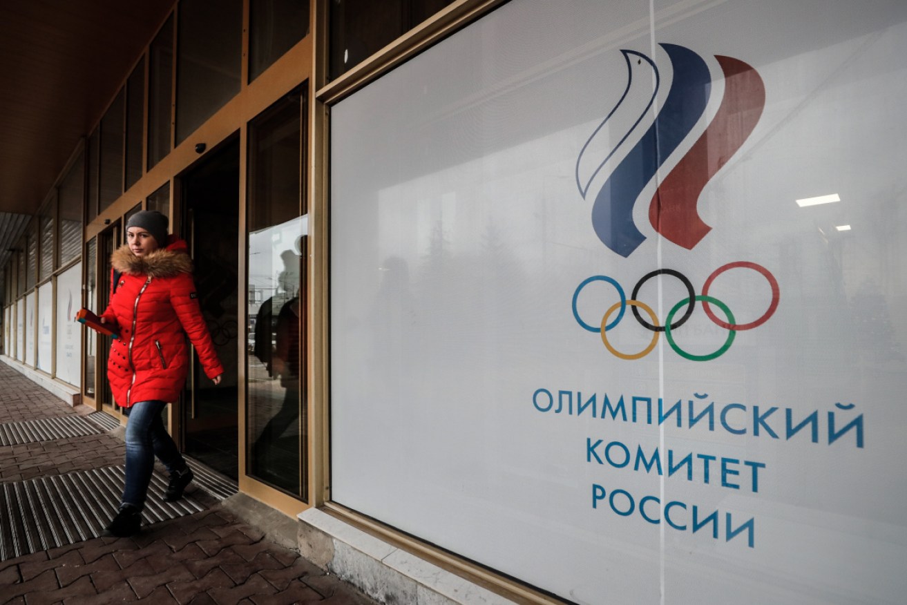 A Russian woman leaves the Russian Olympic Committee headquarters  in Moscow on Monday  before the WADA decision. 