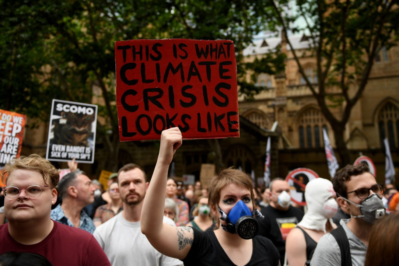 Protesters at the December 11 "Sydney is Choking" rally demand more action on climate change.