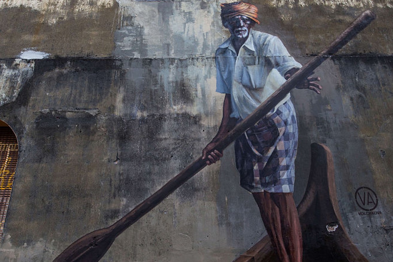 GEORGETOWN, PENANG, MALAYSIA - 2016/02/16: George Town Penang Street Art is composed on crumbling old walls in the old parts of the city. Most of the more artistic murals and street art were created by a Lithuanian artist Ernest Zacharevic who lived in Penang for a few years. His artworks are humorous but at the same time open to interpretation. Besides the paintings and murals, there are also steel rod wire sculptures scattered around the old sections of George Town with more local and somewhat less artistic themes. (Photo by John S Lander/LightRocket via Getty Images)