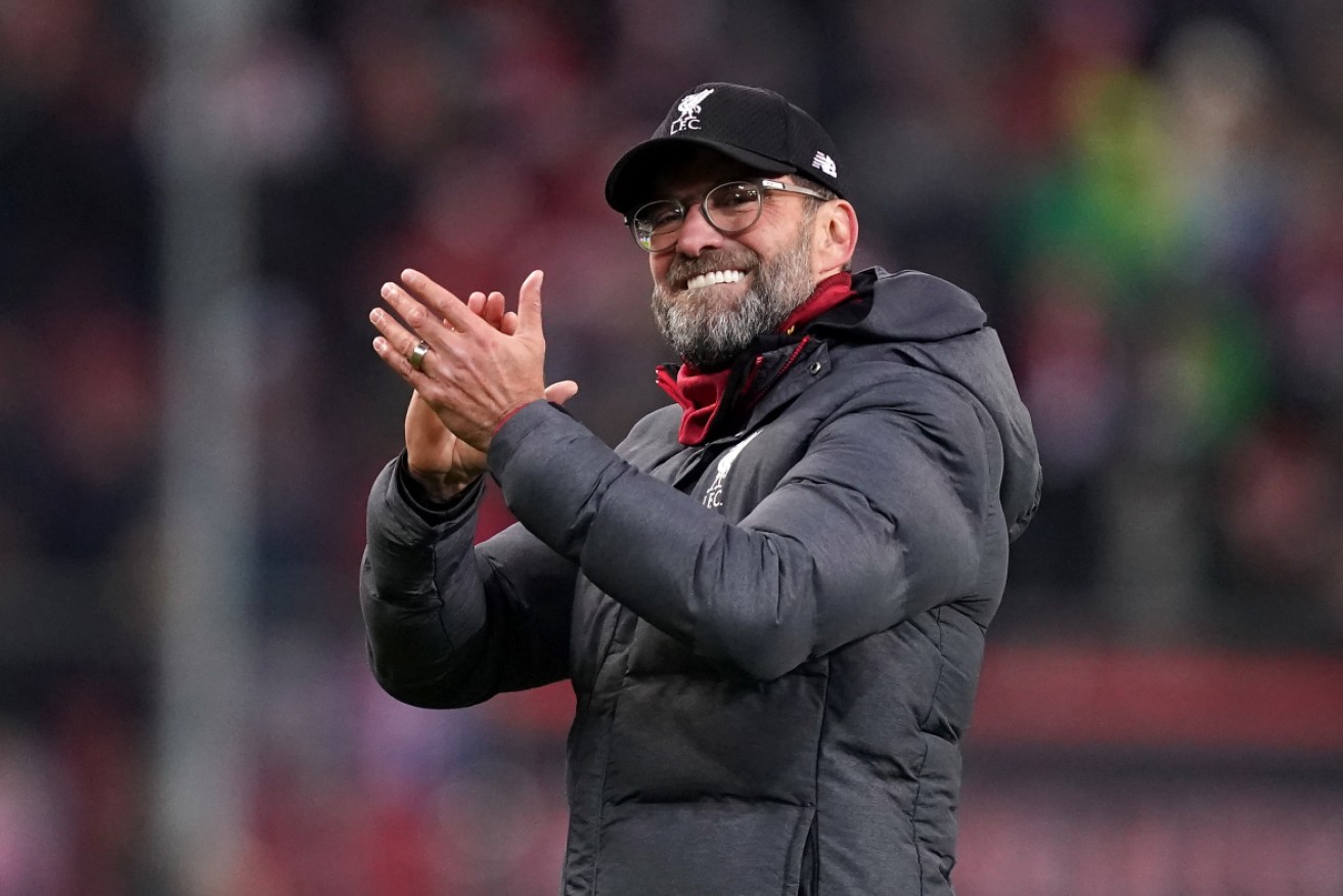 Liverpool are on the verge of a first top-flight English title in 30 years but manager Juergen Klopp has urged supporters to back the Reds from home.